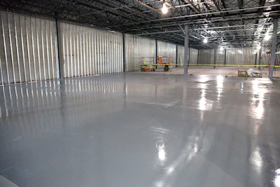 Resinous flooring systems provide a continuous, seamless barrier that protects the underlying concrete substrate from degradation.