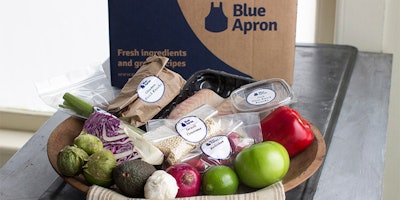 FILE - This Oct. 6, 2014, file photo shows an example of a home delivered meal from Blue Apron, in Concord, N.H. On Wednesday, June 28, 2017, Blue Apron, the meal-kit delivery company, slashed the price it expects to sell its shares by as much as 40 percent, a sign that the company may be having trouble attracting investors. (AP Photo/Matthew Mead, File)