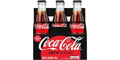 This photo provided by Coca-Cola shows a six-pack of bottled Coca-Cola Zero Sugar. Coke Zero is getting a makeover as Coke Zero Sugar in the United States. The new cans and bottles, which will incorporate more red like regular Coke, will start hitting shelves in August 2017. The company says people didn’t always understand that Coke Zero’s name means it has no calories. The push comes as Diet Coke’s sales continue to decline. (Rodger Macuch/Courtesy of Coca-Cola via AP)