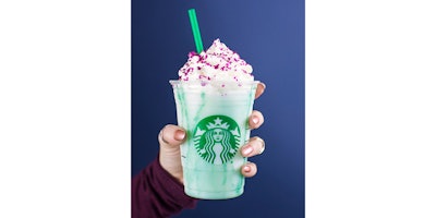 This undated photo provided by Starbucks shows the new Crystal Ball Frappuccino beverage. The sparkling candy sprinkles-festooned drink will be available for five days in the U.S., Canada and Mexico. It follows similar limited-time drinks, such as the coffee chain's color-changing Unicorn Frappuccino. (Courtesy of Starbucks via AP)