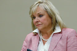 FILE - In this July 30, 2018, Oklahoma Gov. Mary Fallin listens during a meeting in Oklahoma City. Fallin and Cherokee Nation Principal Chief Bill John Baker have announced a council to study the expansion of poultry operations in northeastern Oklahoma. (AP Photo/Sue Ogrocki, File)