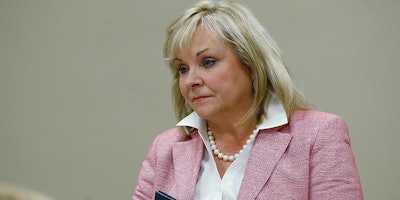 FILE - In this July 30, 2018, Oklahoma Gov. Mary Fallin listens during a meeting in Oklahoma City. Fallin and Cherokee Nation Principal Chief Bill John Baker have announced a council to study the expansion of poultry operations in northeastern Oklahoma. (AP Photo/Sue Ogrocki, File)