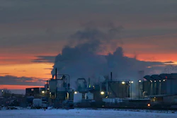 FILE - In this Jan. 11, 2016 file photo, dawn approaches over the meat processing plant owned and run by Cargill Meat Solutions, in Fort Morgan, a small town on the eastern plains of Colorado. The U.S. Equal Employment Commission said Friday, Sept. 14, 2018 that Cargill has agreed to pay $1.5 million to 138 Somali-American Muslim workers who were fired from the plant in 2016 after they were refused prayer breaks. (AP Photo/Brennan Linsley, File)