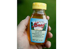 In this Friday Oct. 12, 2018 photo, a bottle of Tupelo honey is shown in Wewahitchka, Fla. Hurricane Michael's devastation could threaten the tupelo honey production in the tiny community that is the main source of the sweet delicacy.(AP Photo/Chris O'Meara)