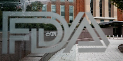 This Aug. 2, 2018, file photo shows the U.S. Food and Drug Administration building behind FDA logos at a bus stop on the agency's campus in Silver Spring, Md. The U.S. government isn’t doing routine food inspections because of the partial federal shutdown, but checks of the riskiest foods are expected to resume next week. The FDA said Wednesday, Jan. 9, 2019, that it's working to bring back about 150 employees to inspect riskier foods such as cheese, infant formula and produce. (AP Photo/Jacquelyn Martin, File)