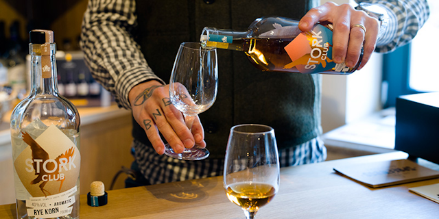 In this Thursday, Feb. 28, 2019 photo, Bastian Heuser co-owner of German whiskey maker Spreewood Distillery tests rey whiskey during an interview with the Associated Press in Schlepzig, Germany. (AP Photo/Markus Schreiber)