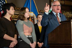 Minnesota Gov. Tim Walz speaks at a press conference at the State Capitol on Wednesday, Dec. 4, in St. Paul, MN. At his left were two teens, Will Gitler and Claire Hering, who spoke about being vaping addicts.