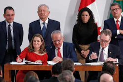 Deputy Prime Minister of Canada Chrystia Freeland, left, Mexico's top trade negotiator Jesus Seade, center, and U.S. Trade Representative Robert Lighthizer, sign an update to the North American Free Trade Agreement, at the national palace in Mexico City on Tuesday, Dec. 10. Observing from behind are Mexico's Treasury Secretary Arturo Herrera, left, Mexico's President Andres Manuel Lopez Obrador, second left, Mexico's Labor Secretary Maria Alcade, third left, and The President of the Mexican Senate Ricardo Monreal.