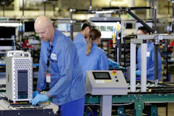 In this Nov. 20, 2019 file photo, workers assemble Apple products at an Apple manufacturing plant in Austin, TX.