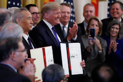 President Donald Trump and Chinese Vice Premier Liu He hold the U.S. China Trade Agreement after signing it in the East Room of the White House on Wednesday, Jan. 15 in Washington.
