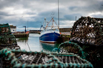 In this Jan. 28 photo, a fishing vessel is docked at Kilkeel harbor in Northern Ireland. The United Kingdom and the European Union are parting ways on Friday and one of the first issues to address is what will happen to the fishing grounds they shared.