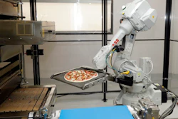 In this Aug. 29, 2016, file photo, a robot places a pizza into an oven at Zume Pizza in Mountain View, Calif. It has not been a good week for robots in the San Francisco Bay Area. A Silicon Valley company that used robots to make its pizzas closed this week and three coffee shops in downtown San Francisco that used robots as baristas also shuttered.