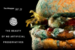This undated image provided by Burger King shows an advertising campaign image with the Whopper hamburger. The burger chain is showing its Whopper covered in mold in print and TV ads running in Europe and the U.S. The message: Burger King is removing artificial preservatives from the Whopper.