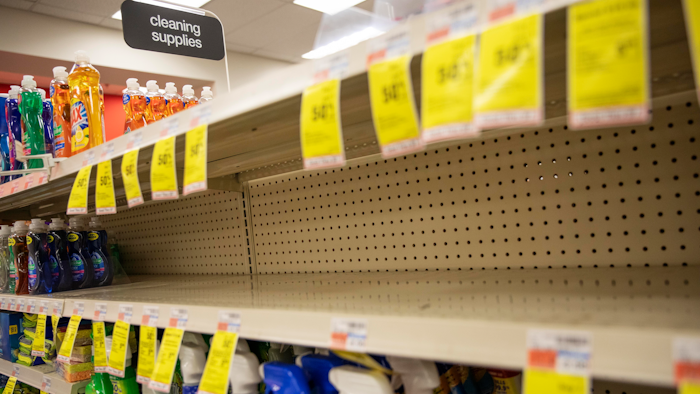 In this March 4, 2020 file photo, shelves where disinfectant wipes and sprays are usually displayed sit empty in a pharmacy in Providence, RI as confirmed cases of the coronavirus rise in the US. Legions of nervous hoarders are stocking up on canned goods, frozen dinners, toilet paper, and cleaning products. Such hoarding that's expected to last for weeks has created big challenges for discounters and grocery stores as well as food delivery services.