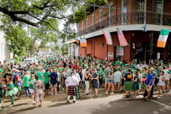 Revelers celebrate St. Patrick's Day on Saturday, March 14 during an unofficial gathering at Tracey's Original Irish Channel Bar in New Orleans.
