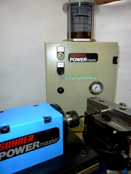 Drilling an 8 mm (D) hole in stainless steel 25 mm deep using a carbide tool with coolant-through capability, an AccuLube-Booster, and a BEX 15 machining unit.