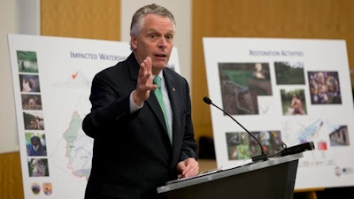 Virginia Gov. Terry McAuliffe gestures during a news conference at the Capitol in Richmond, Va., Thursday, Dec. 15, 2016. McAuliffe announced a proposed $50 million settlement to resolve claims stemming from the release of mercury from the former E.I. du Pont de Nemours and Company (DuPont) facility in Waynesboro, Virginia.