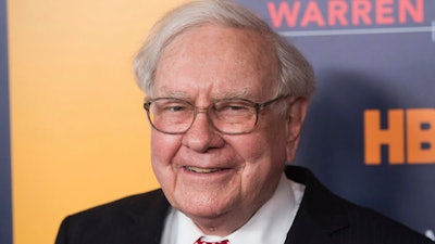 In this Thursday, Jan. 19, 2017, file photo, Warren Buffett attends the world premiere screening of HBO's 'Becoming Warren Buffett' at The Museum of Modern Art in New York. Buffett said he’s investing heavily in Apple, believing that once consumers begin using the company’s products they aren’t likely to stop. Buffett said on CNBC Monday, Feb. 27, 2017, that Berkshire Hathaway holds about 133 million shares of Apple after buying more stock earlier this year.