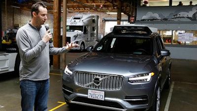 In this Dec. 13, 2016, file photo, Anthony Levandowski, head of Uber's self-driving program, speaks about their driverless car in San Francisco. Levandowski, an autonomous vehicle expert who defected from Google last year, notified Uber’s staff of that he is stepping aside Thursday, April 27, 2017, in an email. He will remain at Uber, but won’t oversee a crucial self-driving project targeted in lawsuit filed by Waymo, a rival started by Google.
