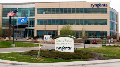 This April 18, 2017, file photo shows the suburban Minneapolis headquarters of Syngenta in Minnetonka, Minn. A trial is poised to begin Monday, June 5, against Swiss agribusiness giant Syngenta over its decision to introduce a genetically engineered corn seed variety to the U.S. market before China approved it for imports.