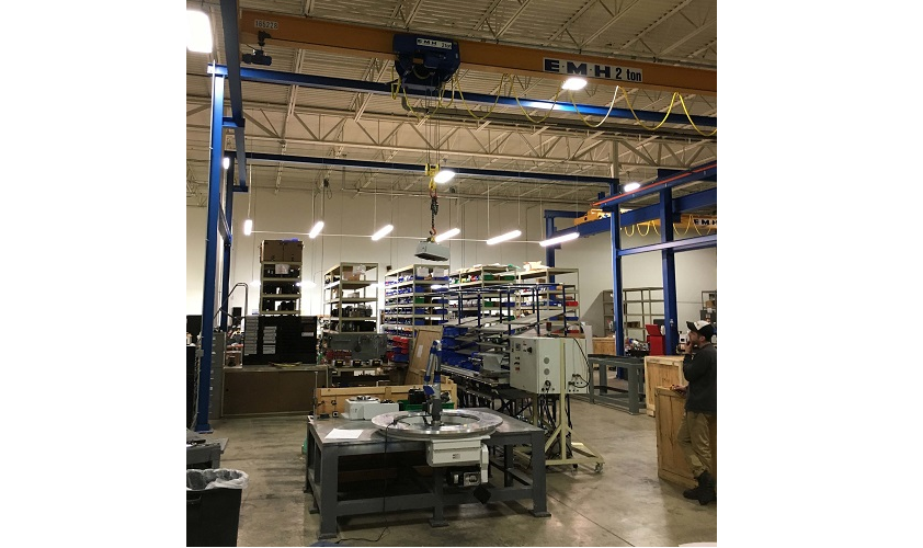 NOMAD Free Standing Cranes enable WEISS operators to easily move rotary indexing chassis components between workstations during assembly.