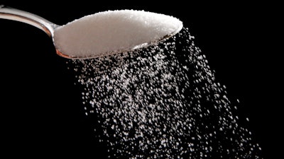 This Monday, Sept. 12, 2016, file photo, shows granulated sugar in Philadelphia. U.S. President Donald Trump recently praised a new sugar deal with Mexico. But U.S. food makers say it will result in Americans paying even more for sugar than they already are.