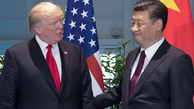 In this Saturday, July 8, 2017, file photo, U.S. President Donald Trump, left, and Chinese President Xi Jinping arrive for a meeting on the sidelines of the G-20 Summit in Hamburg, Germany. After a cordial meeting between Trump and Xi in April 2017, tensions are simmering again between the world’s two biggest economies. As U.S. and Chinese economic officials prepare to meet Wednesday, July 19, in Washington, the U.S. is weighing whether to slap tariffs on steel imports and risk setting off a trade war, a dicey option to deal with a problem caused largely by China’s massive overproduction of steel.