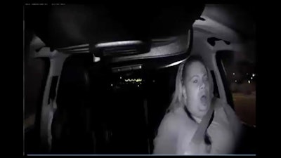 This file image made from video March 18, 2018, of a mounted camera provided by the Tempe Police Department shows an interior view moments before an Uber SUV hit a woman in Tempe, Ariz. In a preliminary report on the crash released Thursday, May 24, federal investigators said the autonomous Uber SUV that struck and killed an Arizona pedestrian in March spotted the woman about six seconds before hitting her, but didn’t stop automatically because emergency braking was disabled.