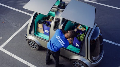 This undated photo provided by The Kroger Co. shows a driverless car that the Cincinnati-based company is about to test whether it can steer supermarket customers away from crowded grocery aisles with a fleet of diminutive driverless cars designed to lower delivery costs. The test program announced Thursday, June 28, 2018, could make Kroger the first U.S. grocer to make deliveries with robotic cars that won’t have a human riding along to take control in case something goes wrong