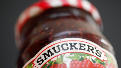 In this Aug. 16, 2010, file photo, a jar of Smucker's preserves is displayed in Philadelphia. J.M. Smucker is doing just about everything asked of it in trying to find areas of faster growth, while ditching some of the packaged foods that fewer people seemingly want. It’s got a long way to go, however, and that may be what is being reflected Tuesday, July 10, 2018, as investors sell off shares of J.M. Smucker as well as other companies in the sector Tuesday.