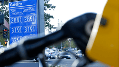 In this Oct. 30, 2017, file photo, gasoline prices are displayed at a Chevron station in Sacramento, Calif. California voters will soon decide whether to drive out a gasoline tax increase passed to fund transportation projects across the state. Proposition 6 seeks to repeal last year's decision by the Democratic-led Legislature to raise fuel taxes and vehicle fees to pay for roughly $5 billion a year in highway and road improvements and transit programs.