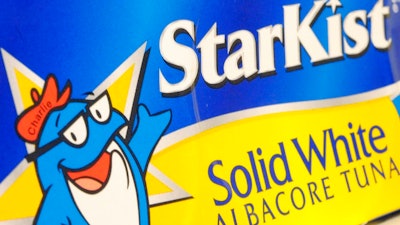 In this June 30, 2008 file photo a StarKist brand product is seen on a grocery store shelf in Boston. Authorities say StarKist has agreed to plead guilty to price fixing as part of a broad collusion investigation of the industry. Federal prosecutors announced the plea agreement Thursday and said the company faces a maximum fine of $100 million. Bumble Bee Foods last year pleaded guilty to the same charge and paid a $25 million fine.