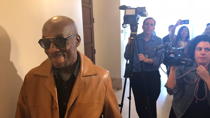 In this file photo, plaintiff DeWayne Johnson, a school groundskeeper who says Roundup weed-killer caused his cancer, leaves a courtroom in San Francisco.