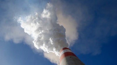 In this photo taken Wednesday, Oct. 3, 2018, smoke rises from the chimney of Serbia's main coal-fired power station near Kostolac, Serbia. Chinese companies are the world's largest investors in overseas coal plants. They are involved in the building of about a fifth of new coal-fired energy capacity around the world, mostly in the countries along its ambitious 'Belt and Road' investment program which is seen in the West as an attempt by China to globally increase its political and economic influence.