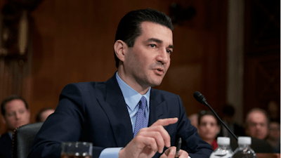 In this April 5, 2017, file photo, Dr. Scott Gottlieb speaks during his confirmation hearing before a Senate committee, in Washington, as President Donald Trump's nominee to head the Food and Drug Administration. The Food and Drug Administration Commissioner is stepping down after nearly two years leading the agency. Health and Human Services Secretary Alex Azar announced Gottlieb’s plan resignation in a statement Tuesday, March 5, 2019.