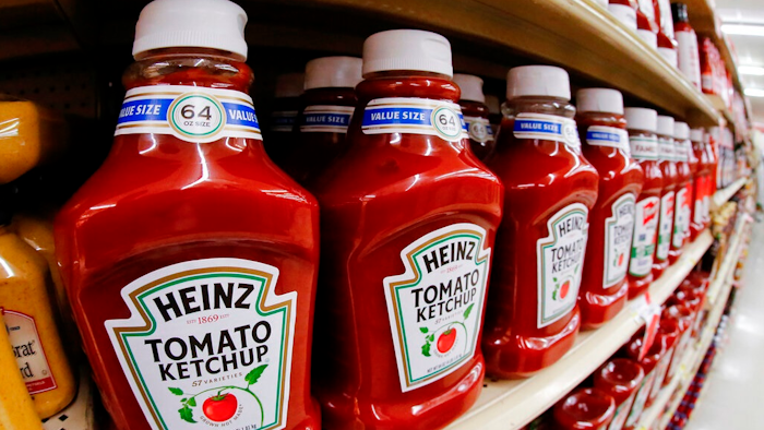 This Feb. 21, 2018, file photo shows a display of Heinz Ketchup in a market in Pittsburgh. Kraft Heinz is restating financial results for 2016, 2017 and the first nine months of 2018. The company has been conducting an internal investigation after the SEC launched a probe into its procurement operations. Kraft Heinz says its investigation is ‘substantially complete.’
