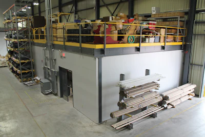 The new mezzanines created a convenient storage space for company supplies, including seasonal decorations.