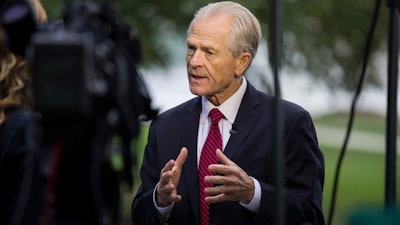 White House trade adviser Peter Navarro speaks during a television interview at the White House on Tuesday, Oct. 8, in Washington.