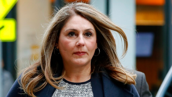 In this Feb. 25, 2020, file photo, Michelle Janavs arrives at federal court in Boston for sentencing in a nationwide college admissions bribery scandal.