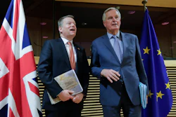 In this Monday, March 2 file photo, European Commission's Head of Task Force for Relations with the United Kingdom Michel Barnier, right, speaks with the British Prime Minister's Europe adviser David Frost during the start of the first round of post -Brexit trade talks between the EU and the UK, at EU headquarters in Brussels. Slowed by the coronavirus pandemic and whipped up by a British-imposed deadline, talks between the EU and the UK on a future relationship in the wake of Brexit are struggling to make significant progress.