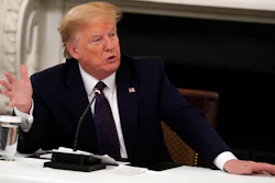 President Donald Trump speaks during a meeting with restaurant industry executives about the coronavirus response, in the State Dining Room of the White House on Monday, May 18.