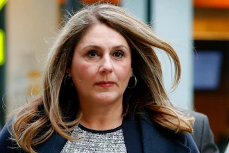 In this Feb. 25, 2020, file photo, Michelle Janavs arrives at federal court in Boston for sentencing in a nationwide college admissions bribery scandal.