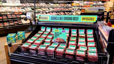 A display of Impossible Burger product at a Wegmans store.