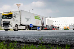 A truck leaves the Toennies meatpacking plant.