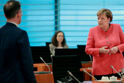 German Chancellor Angela Merkel and German Foreign Minister Heiko Maas attend the weekly cabinet meeting at the chancellery in Berlin, Germany on Wednesday, June 24.