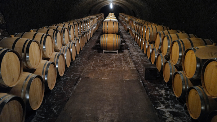 Empty barrels for the next harvest in autumn in the cave of Champagne producer Anselme Selosse in Avize, in the Champagne region east of Paris, on July 28.