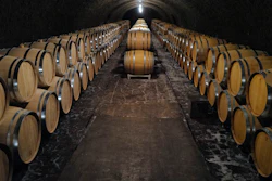 Empty barrels for the next harvest in autumn in the cave of Champagne producer Anselme Selosse in Avize, in the Champagne region east of Paris, on July 28.
