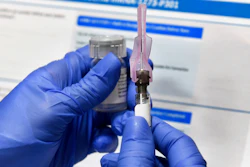A nurse prepares a shot in a study of a possible COVID-19 vaccine in Binghamton, N.Y., July 27, 2020.