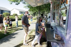 Julie and Greg Schwab wait to order from the Dreamy Drinks food truck on Aug. 10 near the suburb of Lynnwood, WA, north of Seattle.