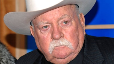 n this Monday, Dec. 14, 2009 file photo, Actor Wilford Brimley attends the premiere of 'Did You Hear About The Morgans' at the Ziegfeld Theater in New York. Wilford Brimley, who worked his way up from stunt performer to star of film such as “Cocoon” and “The Natural,” has died.